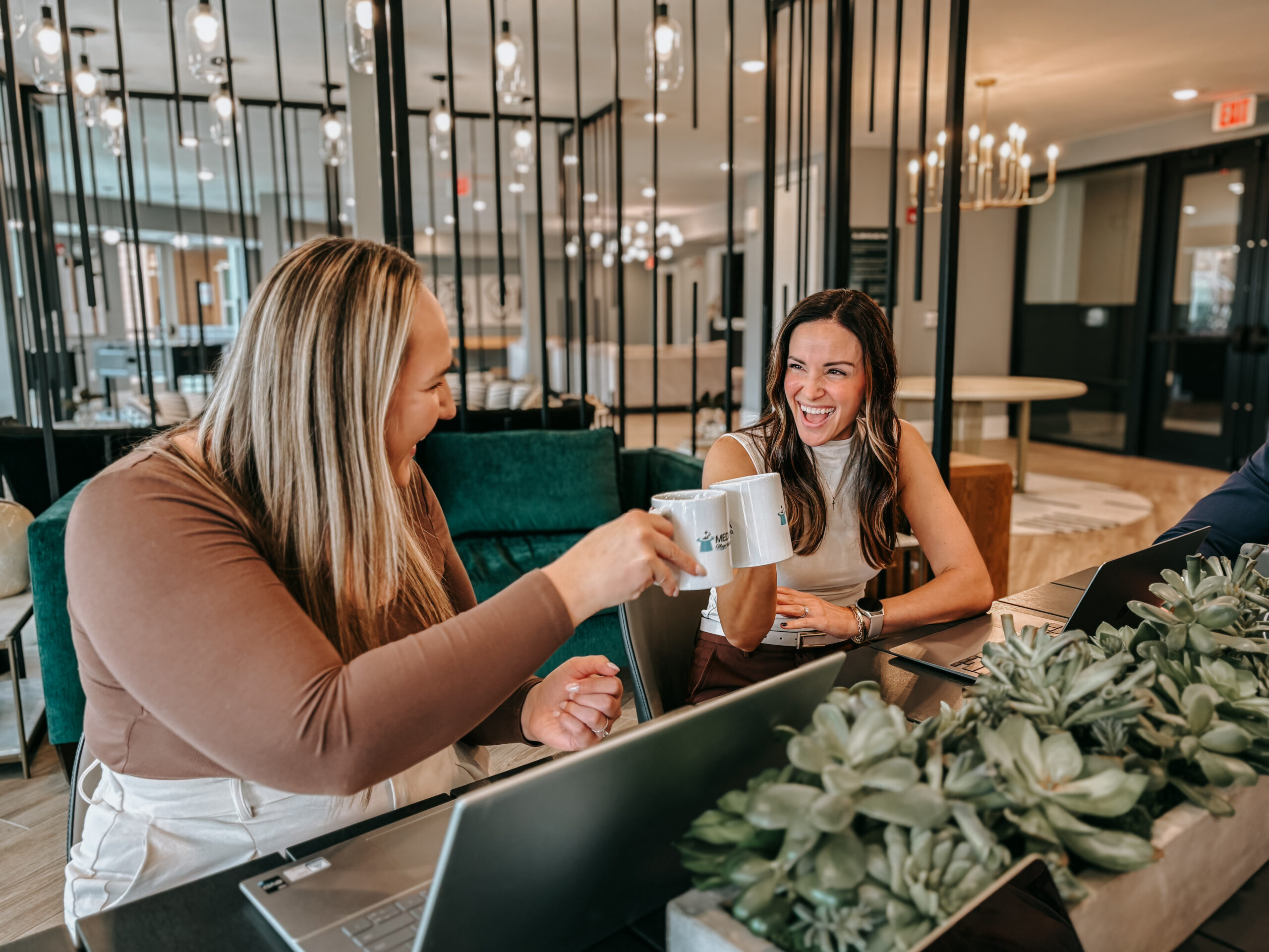 Med Spa Magic Marketing team members collaborating in the office